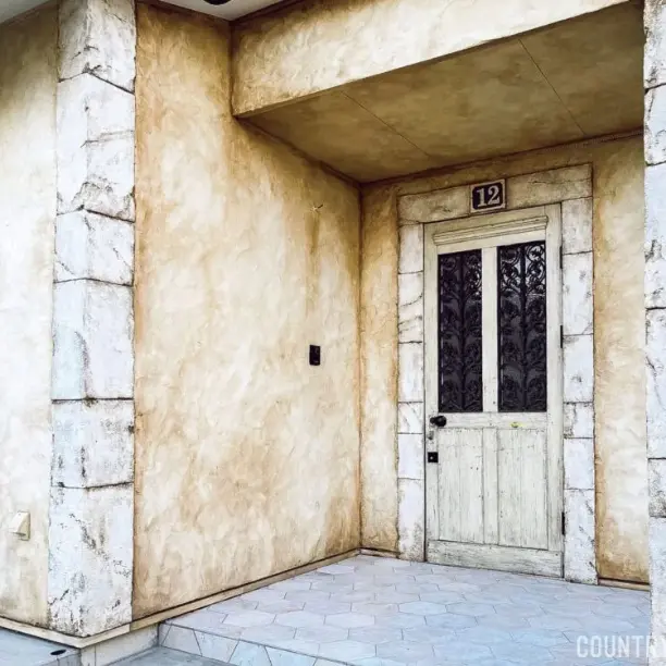 レンガ調のデザコンウォールの玄関アプローチ